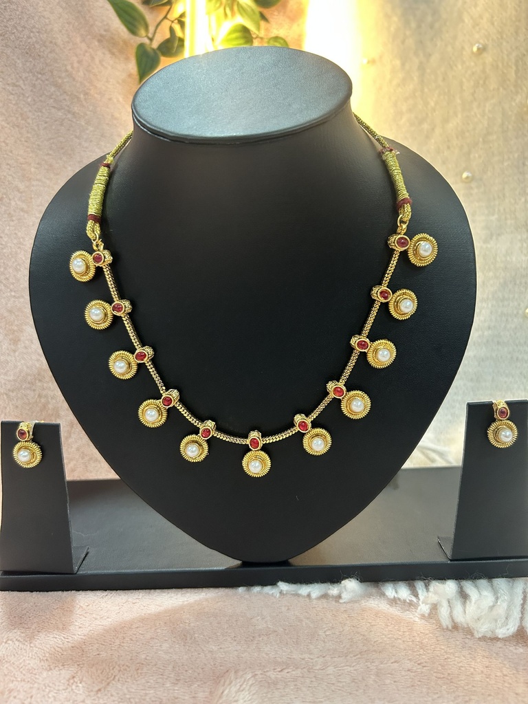 Exotic Golden Kundan Necklace with White Pearls